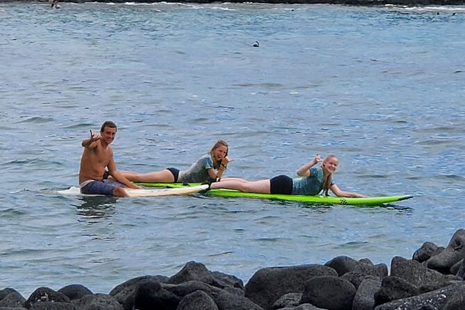 2-Hour Guided Private Surf Lesson in Kona - Gear fit at the sand: foam top board, reef shoes, SPF surf shirt