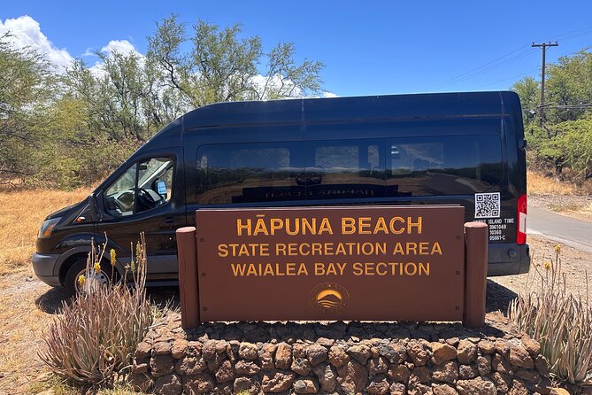 Kona Cruise Ship Excursion Hapuna Beach Day & NHS - First Beach Stop: Turquoise Water, Soft Sand, and Lava Rock Cliffs