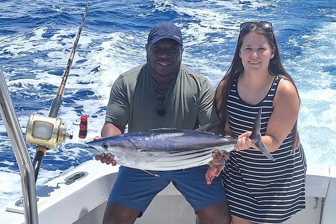 Kona Hawaii Deep Sea Fishing Escapade on the Bite Me 6 - Your crew: Captain Brian, Cam/Cameron, Neal, and the team style